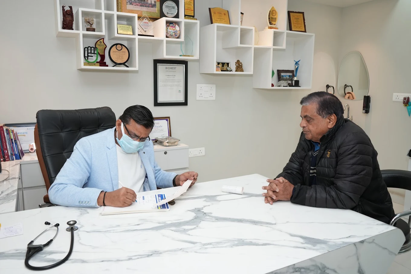 Doctor consulting with a patient at Ansh Medicare Doctors Clinic